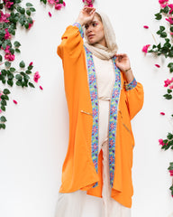 Orange open poncho with Indian tape